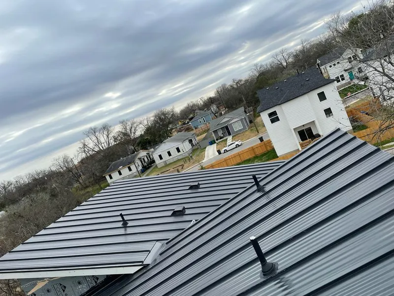 Standing seam metal roof panels with vents for Skylight Repair in Mayfield Heights